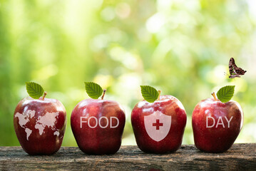 World food day concept: Apple fruits on nature background.