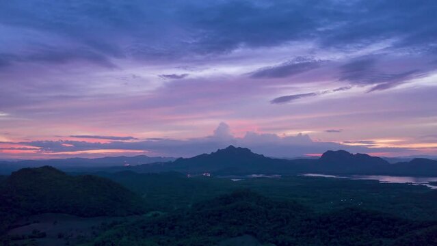 Aerial shot of the hills and mountains at sunset in Raja Ampat, Indonesia