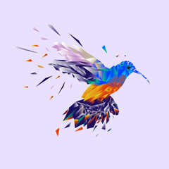 origami vector illustration. colorful flying colibri on a purple background