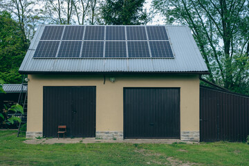 Fototapeta na wymiar Photovoltaic installation in an old garage
