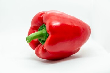 Closeup of a red Bell Pepper isolated on white background