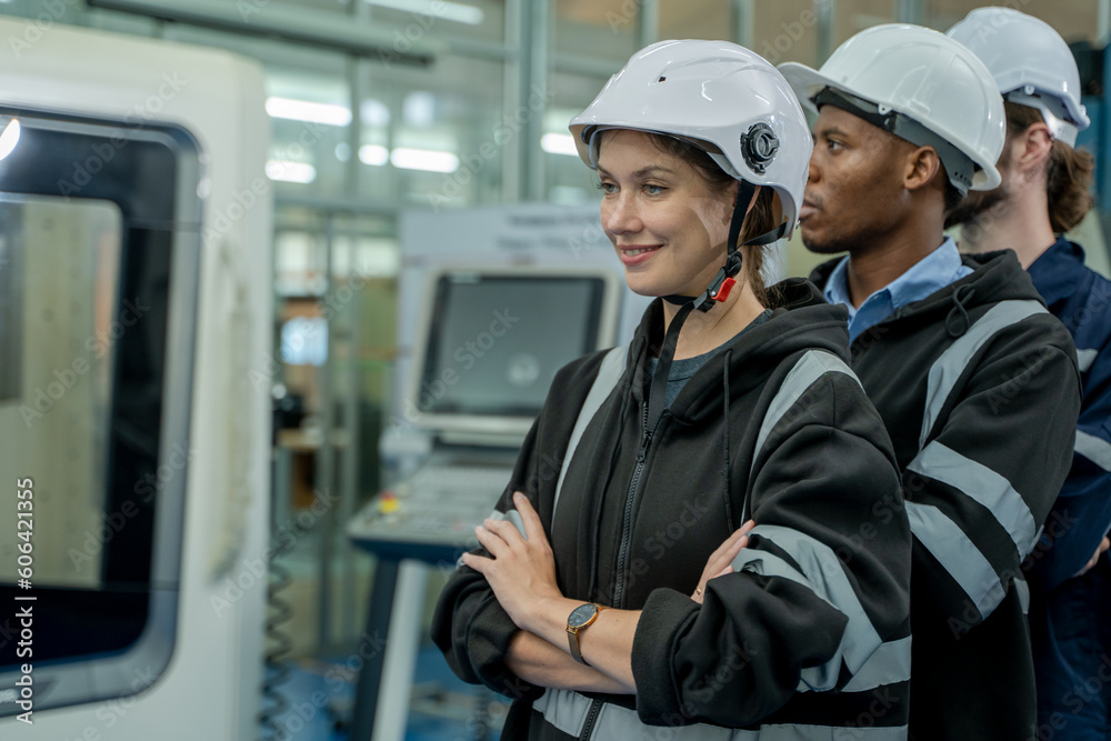 Poster Engineer operating cnc machine in control panel at factory,Industry 4.0 concept.