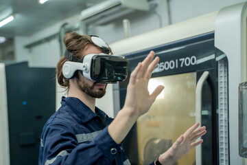 Engineer are using virtual AR to maintain and check the work of CNC machine in the 4.0 smart factory.