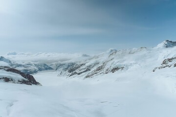 Fototapeta na wymiar Mesmerizing view of beautiful snow-capped mountains
