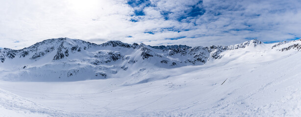 Fototapeta na wymiar The peaks of the Tatra Mountains in the snow