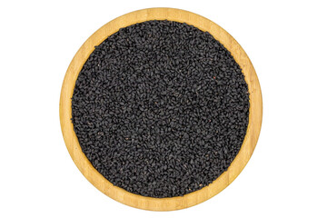 Black cumin or nigella sativa isolated on white background. Black cumin seeds in wooden bowl....