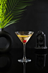 Drink on Black Deep Background with Leaf Decoration