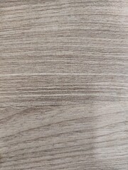 The surface of the table is wood grain.