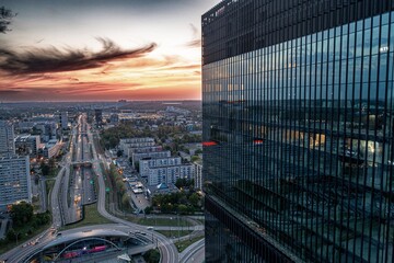 Katowice centre and office towers buildings and Spodek at evening. Aerial drone view. Katowice, Silesia, Poland