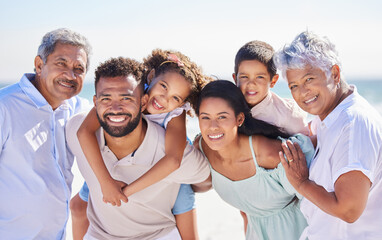 Family in portrait, grandparents and parents with kids on beach, travel and piggyback with love and vacation. Happy people outdoor, generations and trust with tourism in Mexico and bonding together