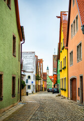 Colourful street of Rothenburg ob der Tauber, the Franconia region of Bavaria, Germany. Medieval old town. The most romantic town in Germany.