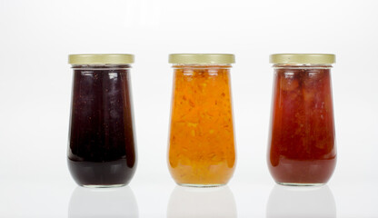 Jam jar fruity flavors on white background