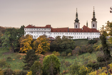 Fototapeta na wymiar Autumn leaves and Strahov Monastery in Prague