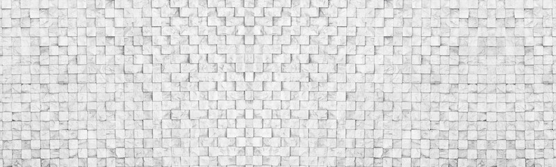 Old shabby distressed white stone brick wall wide texture. Rough whitewashed masonry. Light grey grunge background