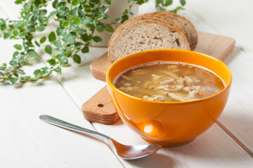Traditional polish tripe soup with vegetables.