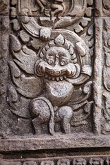 Fototapeta na wymiar Detail of bas-relief in Angkor Wat, Cambodia