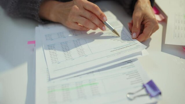 tax time. accountant woman working with documents.