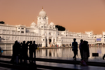 Silhouettes in front of a building at Golden Temple in Amritsar