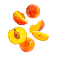 Cut out flying fresh ripe juicy peaches isolated on white background. With clipping path. Summer fruit, organic vegan healthy food. Harvest concept. Creative composition with peaches. Mockup 