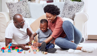 Building blocks, toys and black family playing on a living room floor happy, love and bonding in their home. Child development, learning and kid with parents in a lounge with alphabet, shape and game
