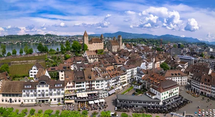 Foto auf Glas Rapperswil - Jona - scenic medieval town and castle in lake Zurich, aerial drone view. Switzerland travel and landmarks. © Freesurf