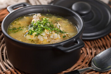 Barley soup with vegetables and chicken.