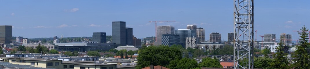 Wide angle view of skyline of City of Zürich North on a sunny spring day. Photo taken May 26th, 2023, Zurich, Switzerland.