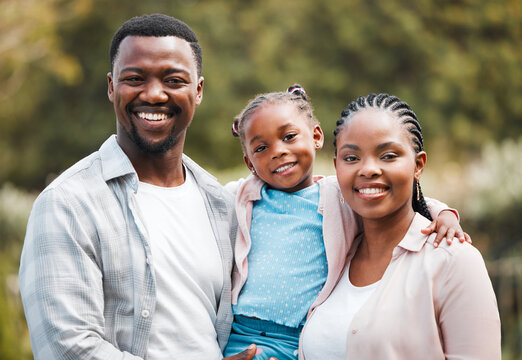Smile, portrait and black family outdoor, hug and happiness with bonding, park and loving together. Face, happy mother and father with female kid, daughter and girl embrace parents, backyard and love