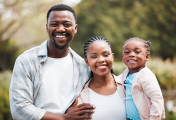 Happy, portrait and black family outdoor, hug and bonding in a park, loving together and weekend break. Face, mother or father with female kid, daughter or embrace with child development and backyard