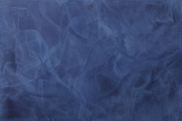 Beautiful abstract art decorative navy dark blue stucco wall background, banner with space for text. Abstract blue background. 