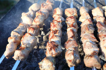 Cooking pork kebabs on skewers