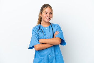 Little caucasian girl disguised as surgeon isolated on white background happy and smiling