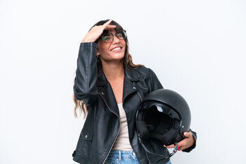 Young caucasian woman with a motorcycle helmet isolated on white background has realized something and intending the solution