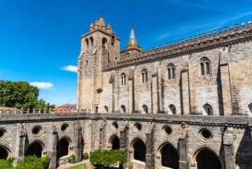 Cathedral of Evora and cloister a sunny blue sky day of summer. Alentejo, Portugal