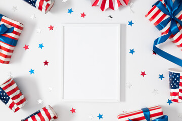 Obraz premium 4th of July, USA Presidents Day, Independence Day, Blank photo frame gift confetti paper cups on white background, party, celebration celebration. Flat lay, top view, copy space, banner