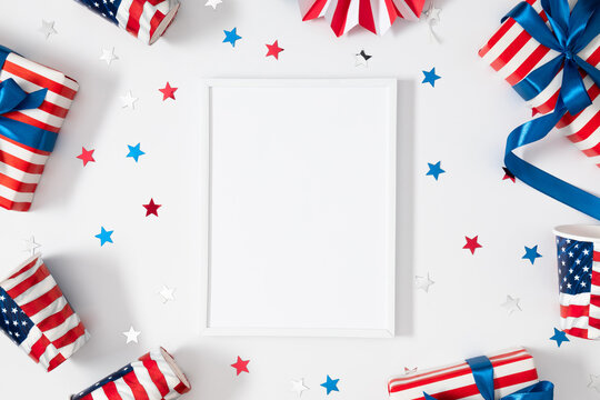 4th of July, USA Presidents Day, Independence Day, Blank photo frame gift confetti paper cups on white background, party, celebration celebration. Flat lay, top view, copy space, banner