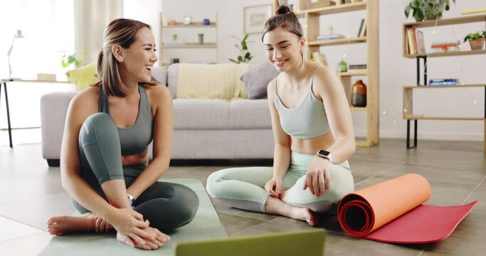 Fitness, yoga and friends in home with laptop planning workout schedule on app, discussion and internet. Streaming subscription for exercise class, online tutorial and women sitting in living room.