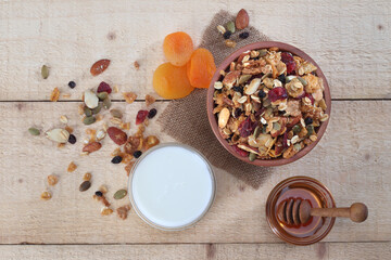 Healthy breakfast mixture with milk and honey.