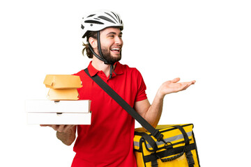 Young delivery man with thermal backpack over isolated chroma key background with surprise facial expression