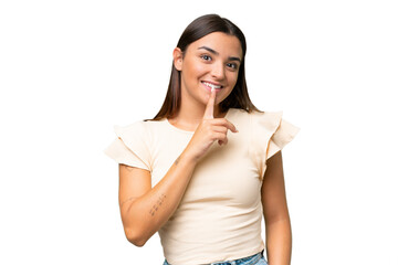 Young caucasian woman isolated on green chroma background showing a sign of silence gesture putting finger in mouth - Powered by Adobe