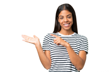 Young African american woman over isolated background holding copyspace imaginary on the palm to insert an ad