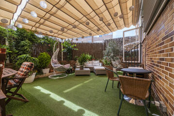 Terrace of a house with artificial grass floors