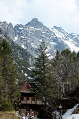 Twilight Haven: Snow-Dusted Mountain Slopes, Enchanting Forest, and Village Delight (Tatra Mountains, Morskie Oko Lake).