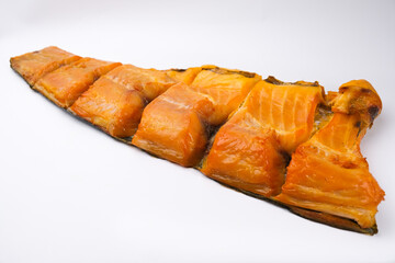 Fish Silver carp cold smoked on a white background.