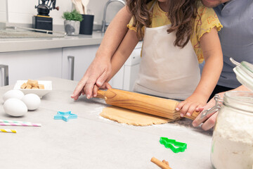 Rolling Delight: Little Baker Kneading Cookie Dough with a Rolling Pin