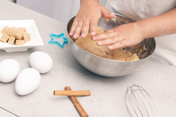 Baking Magic: Little Girl's Hands Shaping Delicious Cookie Dough