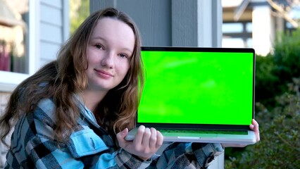 education school advertising entertainment internet games teen Girl show laptop with empty mockup green chroma key screen, It expert, technician repair service, tech support maintenance