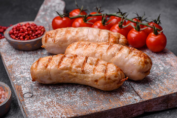 Delicious grilled sausages from chicken or pork meat with salt, spices and herbs
