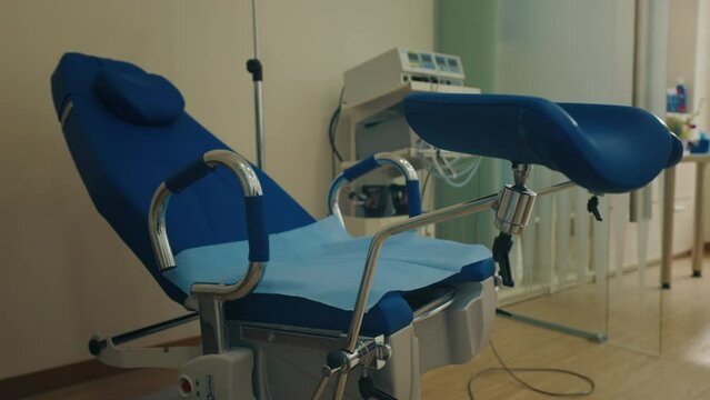 Gynecological Chair in Modern Medical Office. Medical Centre. Gynecology Room. Gynecologist Check Up. Endoscopic Medical Equipment for Checking Women's Health. Health Care Concept. Slow Motion.
