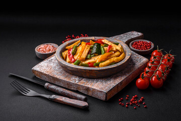 Delicious fried potatoes with bell peppers, asparagus beans, salt and spices